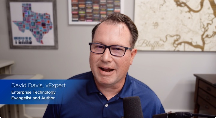 Broadcast-style branded lower-third graphics on a live webinar host camera