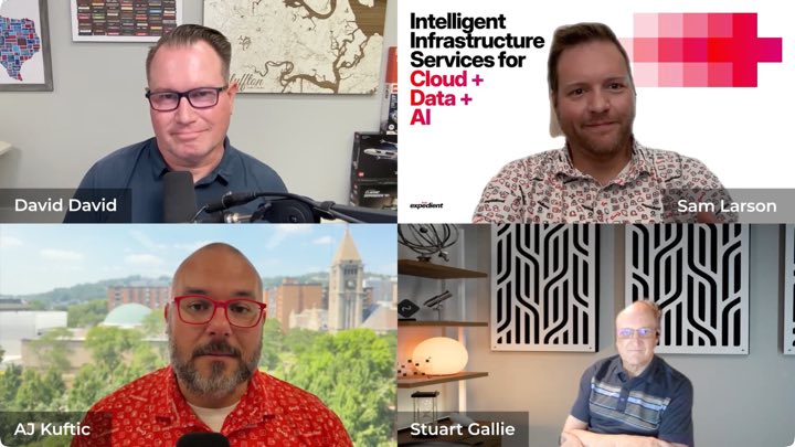 A DemandStage-style production: four-person expert panel webinar with branded graphics and name overlays